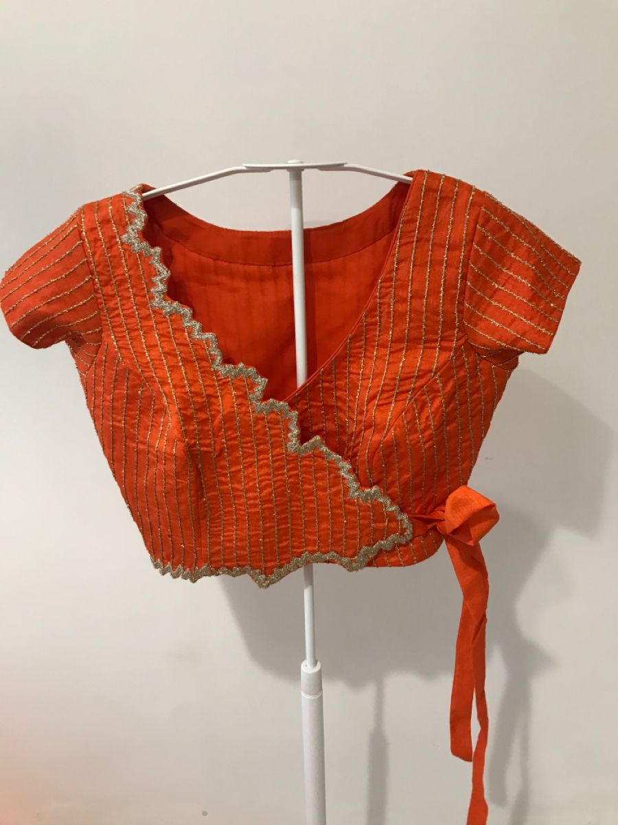 Rust Orange Designer Blouse with Asymmetric Wrap Neck & Gold Thread Work