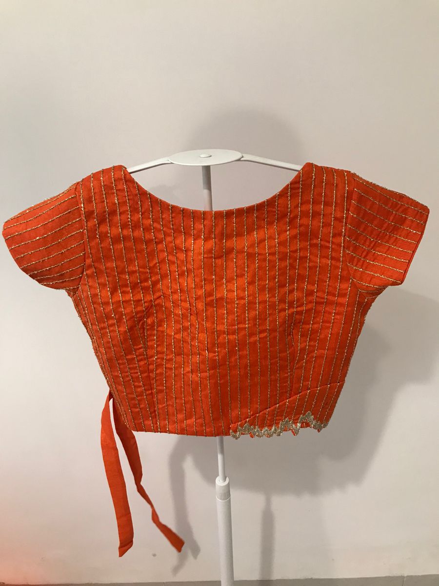 Rust Orange Designer Blouse with Asymmetric Wrap Neck & Gold Thread Work